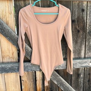 Nude long sleeve body suit from Abercrombie. Never worn